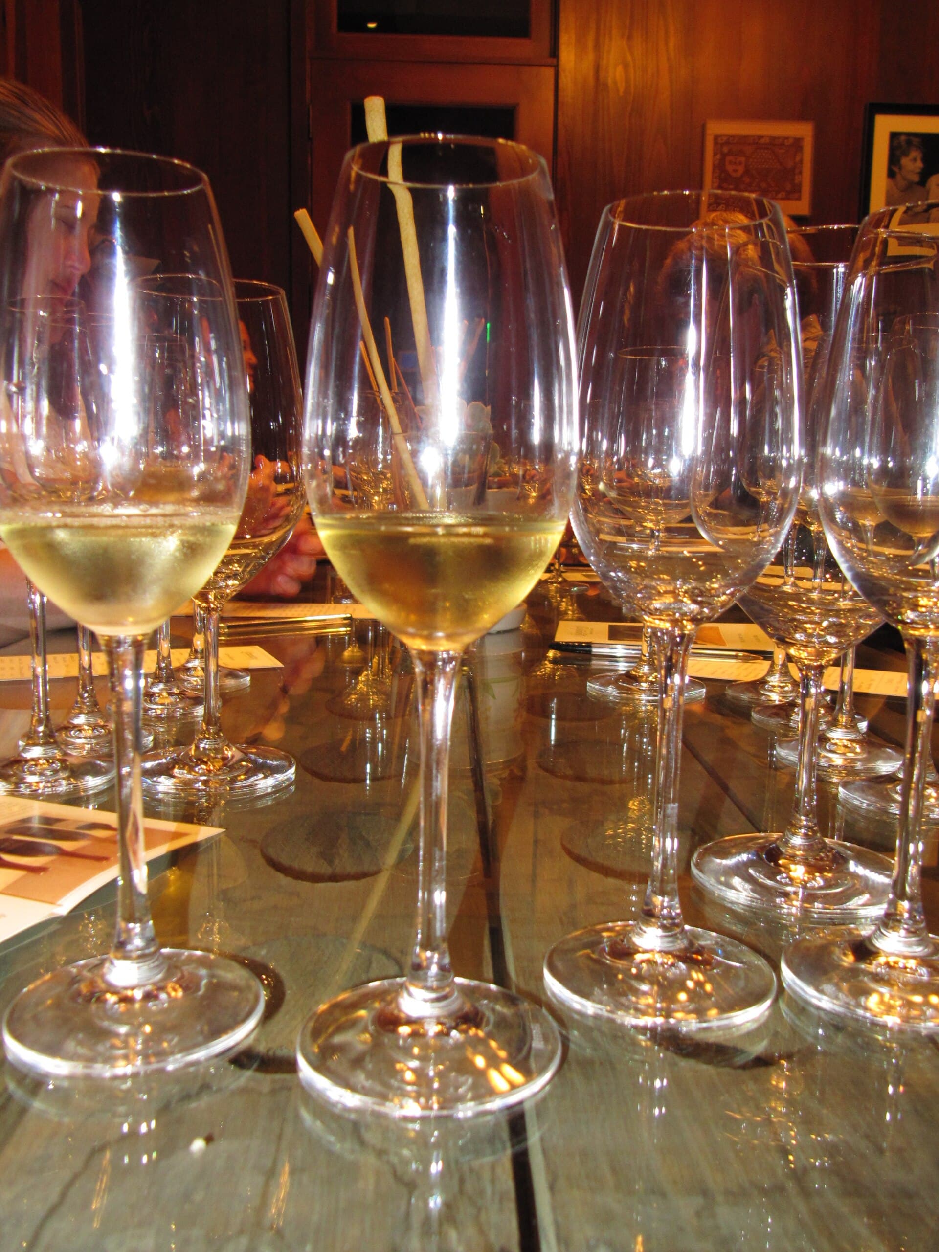 Wine glasses poured for a tasting flight